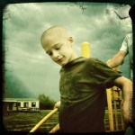 Alex smiling and happy at the park